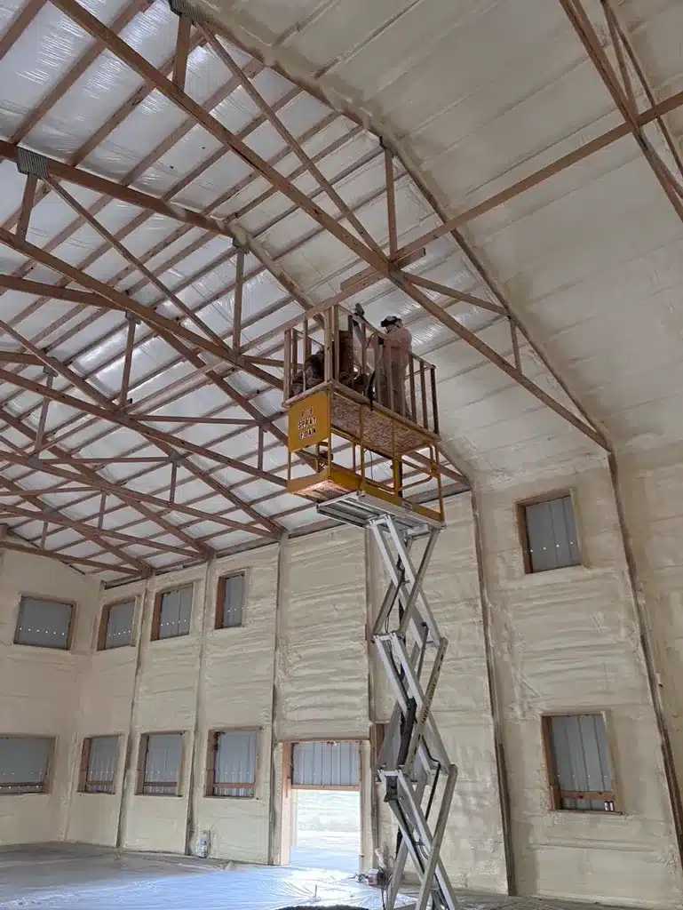 a man on a lift in a building