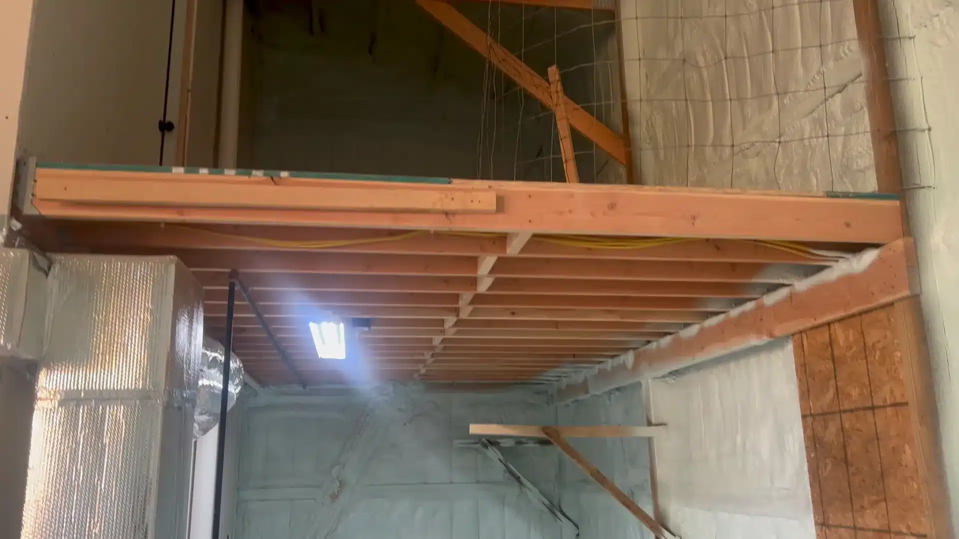 a wooden beam in a room